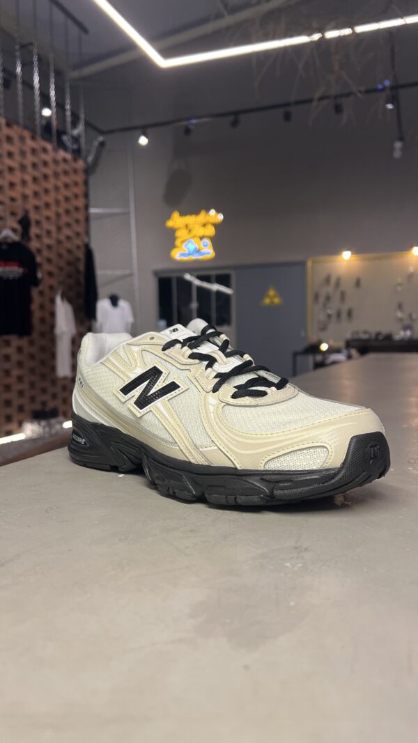 TÊNIS NEW BALANCE REF: U7404OO